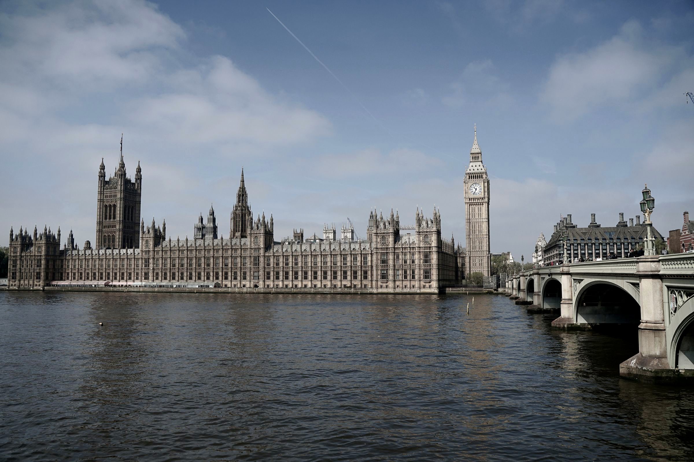 The Houses of Parliament and Big Ben on the River Thames, London