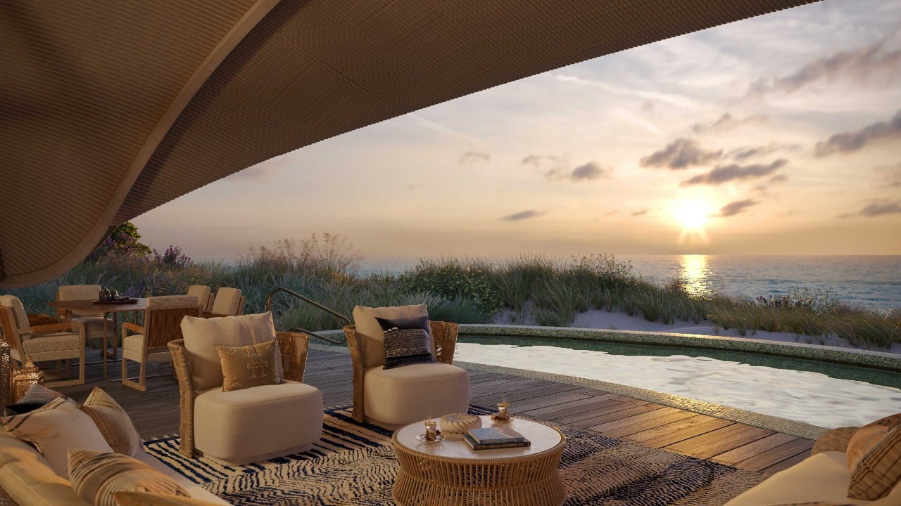 Shaded terrace lounge overlooking the Red Sea at sunset